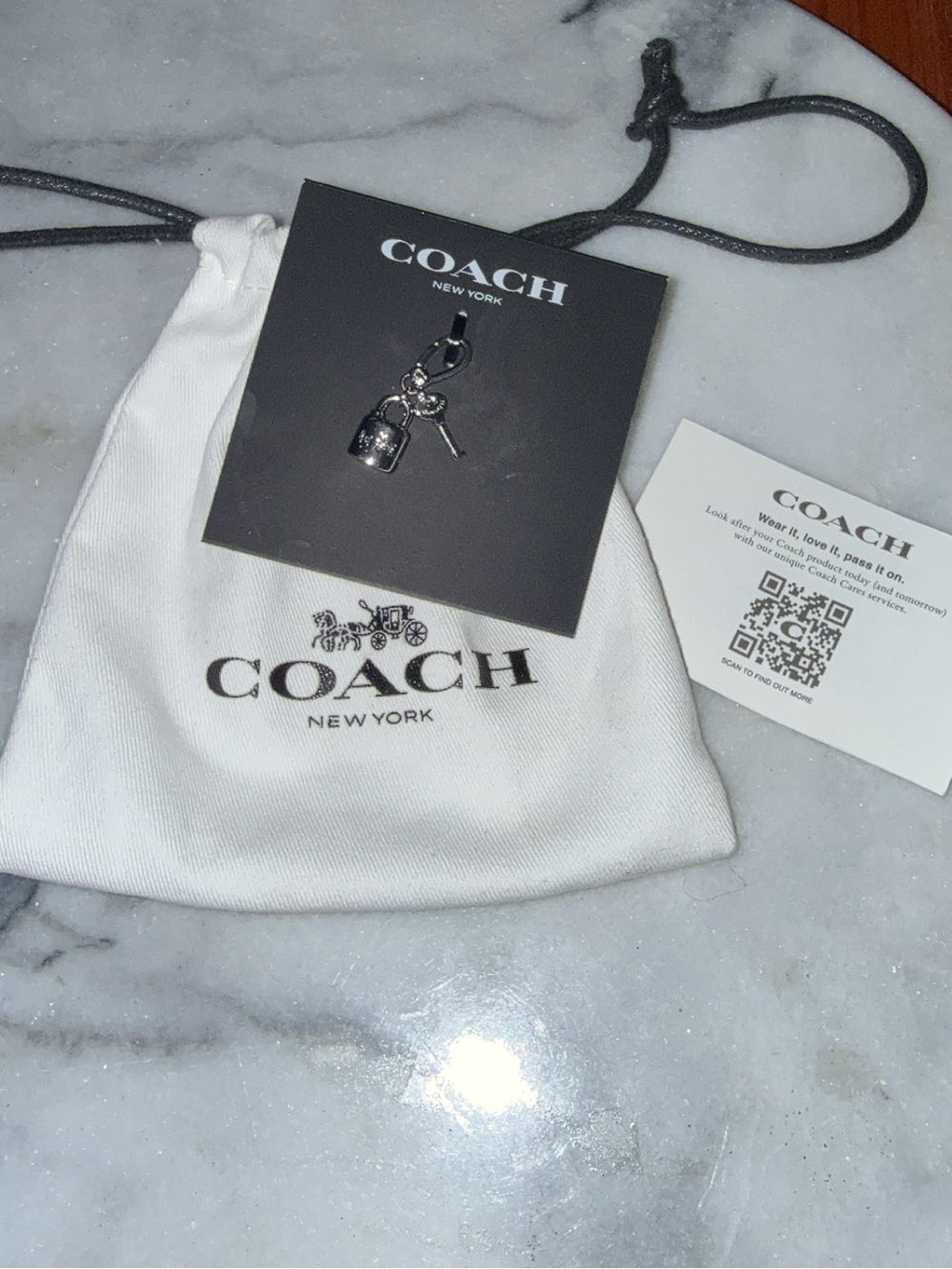 ***SOLD**


NWT Coach Padlock & Key Charm w/ Dust-Bag - Picture 2 of 6